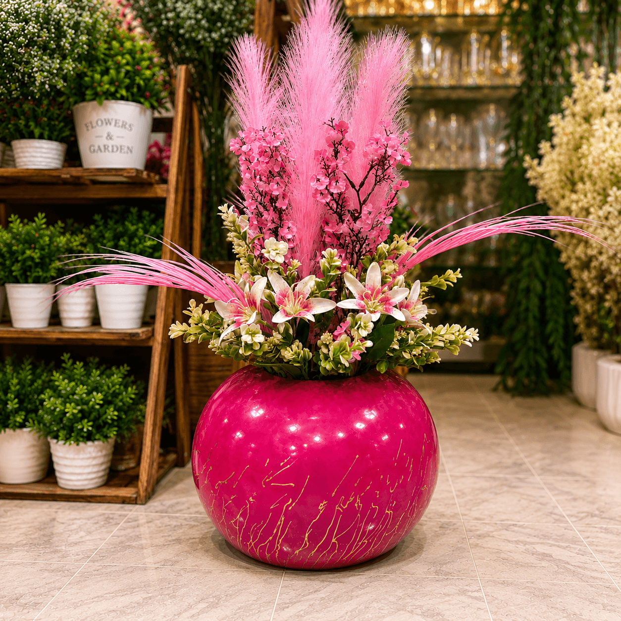 pink round bowl planter with artificial flowers