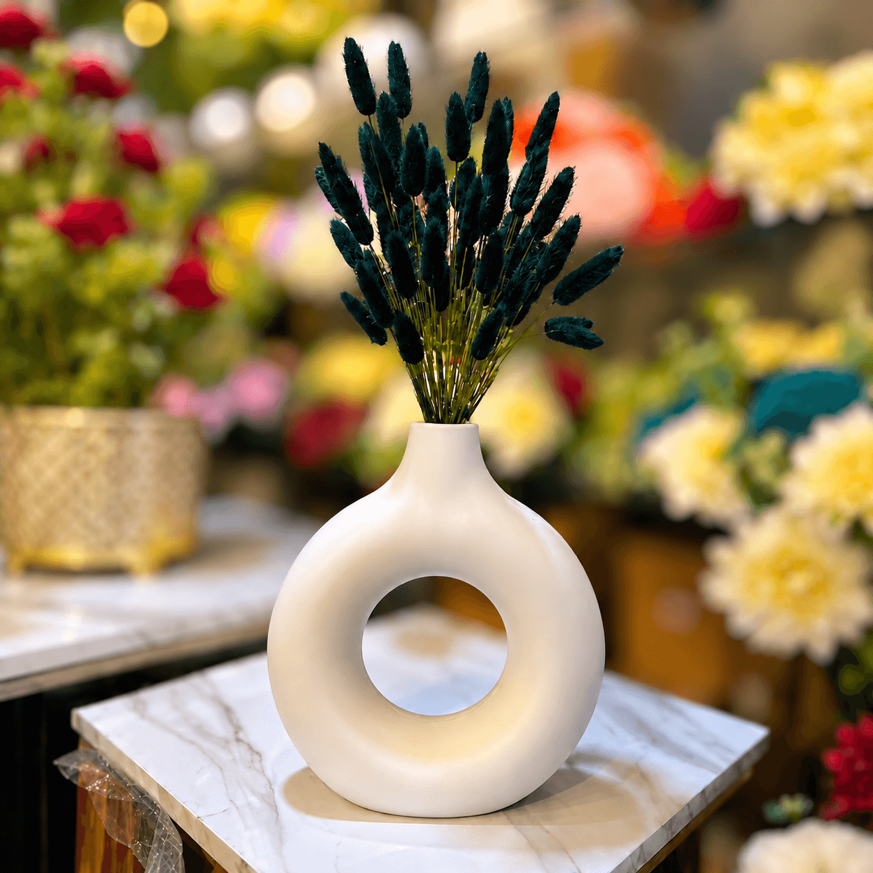 Plastic Donut Vase with black Dried Bunny Tails